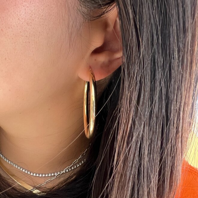 Oversized gold hoop earrings