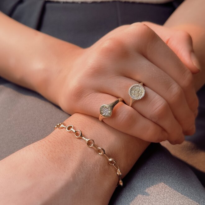 Petite starburst signet ring
