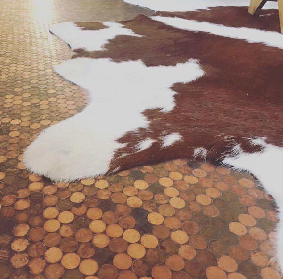 Cowhide Rug on a Penny Floor