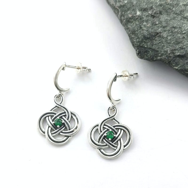 Anu Earrings: SS Knot Grn CZ