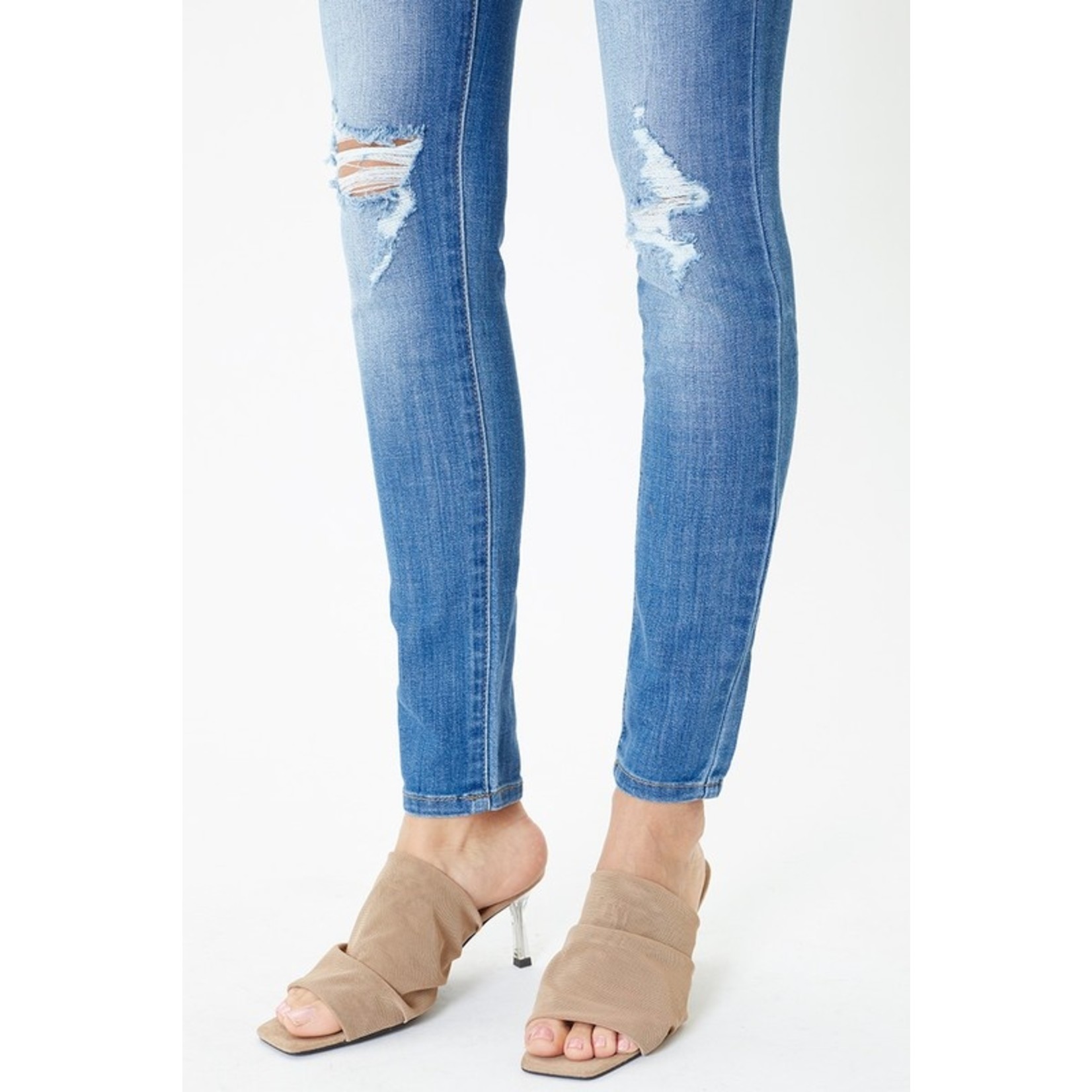 The Mid Rise Distressed Skinny