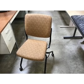 Brown pattern desk chair on castors w/ folding seat (5/4/23)