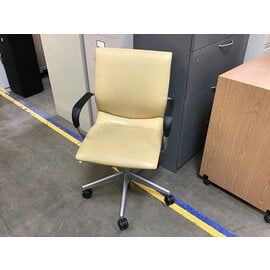 Yellow vinyl desk chair - slightly warn 10/24/23