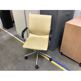 Yellow vinyl desk chair - slightly warn 10/24/23