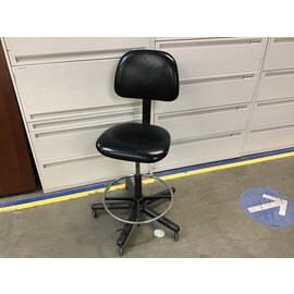 Black vinyl adjustable counter height chair on castors 12/5/23