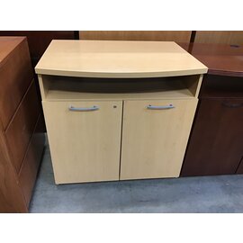 26x36x35” Light oak color stand w/ cabinet on castors 1/18/24