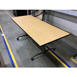 30x62x27” Light wood laminate metal leg table on castors 4/4/24