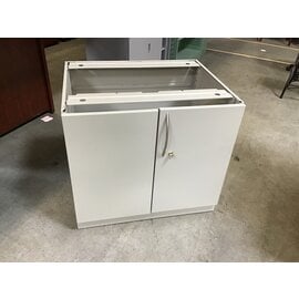 24x30x27” Beige metal two door storage cabinet - no top 4/10/24