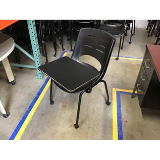 Black plastic left hand tablet arm chair on castors - some light scuffs throughout 6/12/25