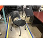 Black plastic left hand tablet arm chair on castors - some light scuffs throughout 6/12/25