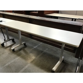 20x72x28 1/2” White speckled laminate seminar table on castors 10/6/25