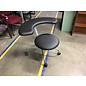 Grey rounded swivel chair on castors - designed for sitting backwards 6/13/25
