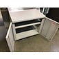 24x26x24”  Beige metal 2 door storage cabinet on castors/copier stand - some wear 10/7/25