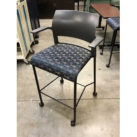 Grey plastic back blue and gold pattern counter height seat chair on castors 10/29/25