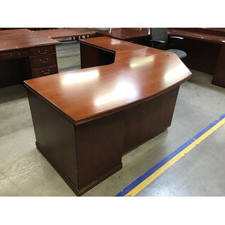78x80” Curved L shaped light cherry color desk. 33” deep 29” tall. 5 drawers left return - some scuffs 11/7/25