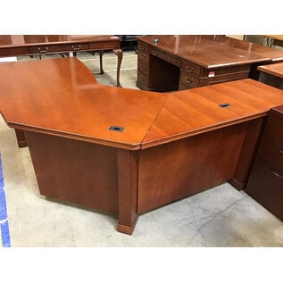 78x80” Curved L shaped light cherry color desk. 33” deep 29” tall. 5 drawers left return - some scuffs 11/7/25
