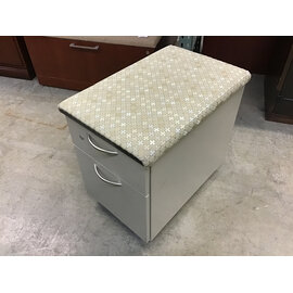 24x16x23” Beige metal 2 drawer storage and file cabinet with tan pattern cushioned top on castors 11/21/25