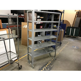 15x42x71” Metal storage rack on castors - some wear and flaking 1/23/26