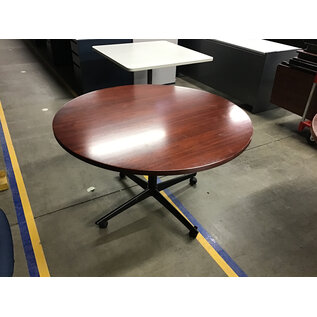 48” Cherry color round table on castors - some wear 3/5/26