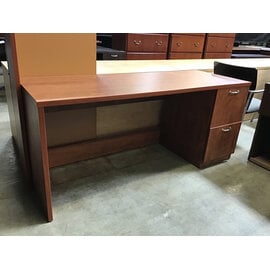 24x66x28 1/2” Light cherry color laminate right pedestal credenza - bottom drawer doesn’t close completely 4/21/26