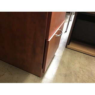 24x66x28 1/2” Light cherry color laminate right pedestal credenza - bottom drawer doesn’t close completely 4/21/26