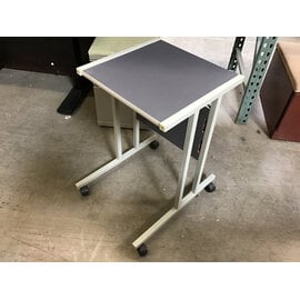 18x19x28” Grey metal frame wood laminate top work station on castors 6/4/26