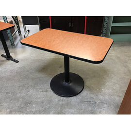 24x42” Brown laminate top black metal pedestal table - some wear throughout 6/8/26