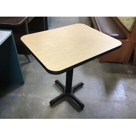 24x30” Light wood grain laminate black metal pedestal table - some wear throughout 6/8/26