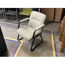Beige cushioned seat and back metal sled frame side chair 7/7/26