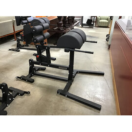 Titan Fitness Glute and Ham Developer - roughly 48x72” footprint 8/7/26