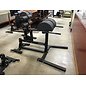 Titan Fitness Glute and Ham Developer - roughly 48x72” footprint 8/7/26