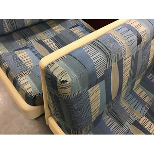 27 1/2” Wide blue and tan pattern cushioned seat sectional piece on castors - some wear and staining throughout 9/25/26