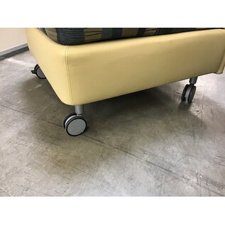 27 1/2” Wide blue and tan pattern cushioned seat sectional piece on castors - some wear and staining throughout 9/25/26