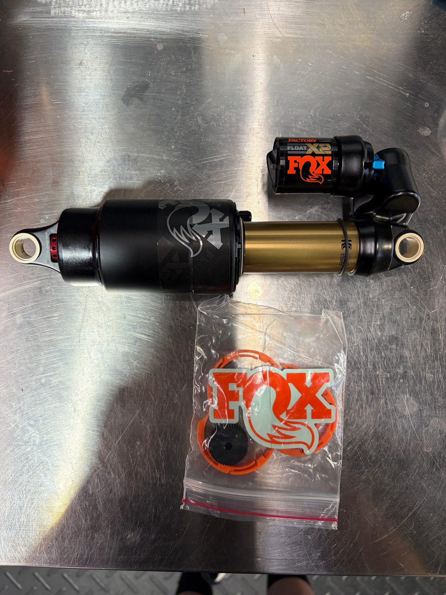 Fox 24/25 Float X2, F-S, K, 2-pos-Adj, FOX, SRV, 230-65, CX002, JCR010, Rezi BX001, Orange, Neutral logo, AM