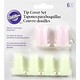 Couvercles à douilles de glaçage en silicone de Wilton