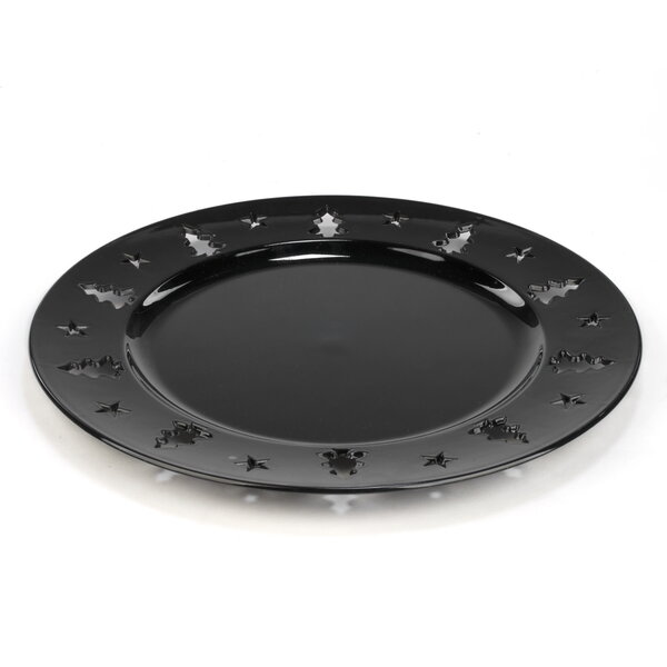Assiette noire avec motif de sapins
