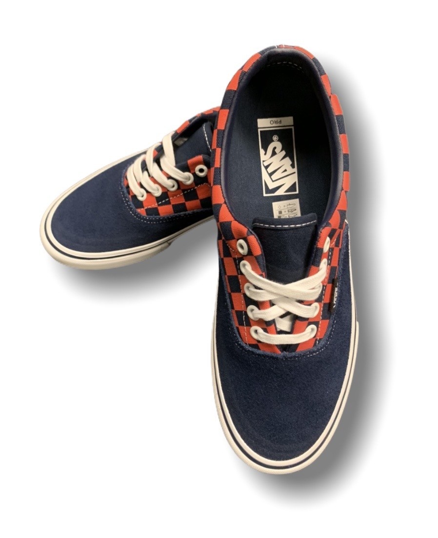 checkerboard vans orange