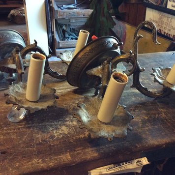 Small brass wall sconce