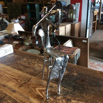 Aluminum figure playing violin