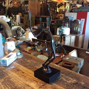 Bronze tennis player figure female