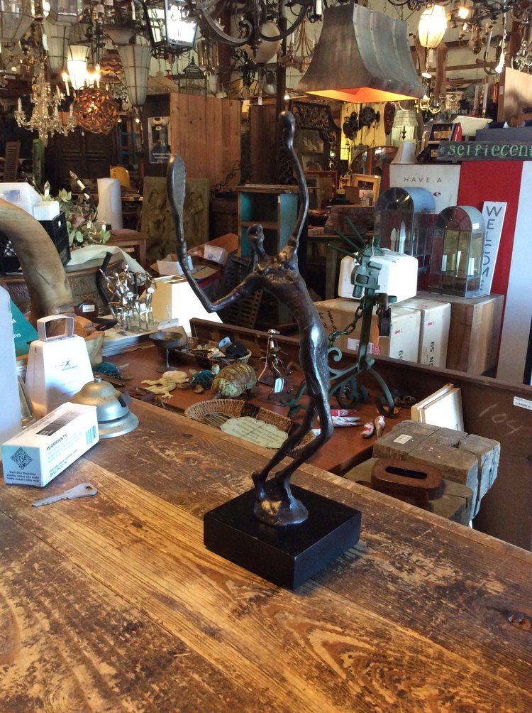 Bronze tennis player figure female