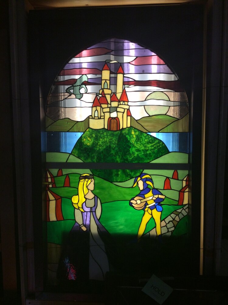 Stained glass jester and princess