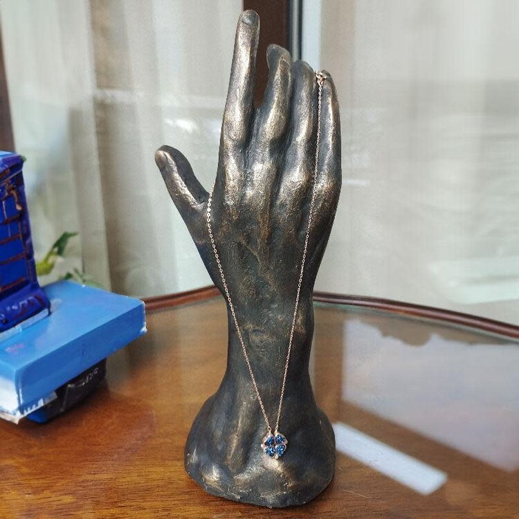 jewler bronze hand