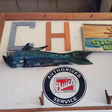 local artist hand carved fish (various styles)