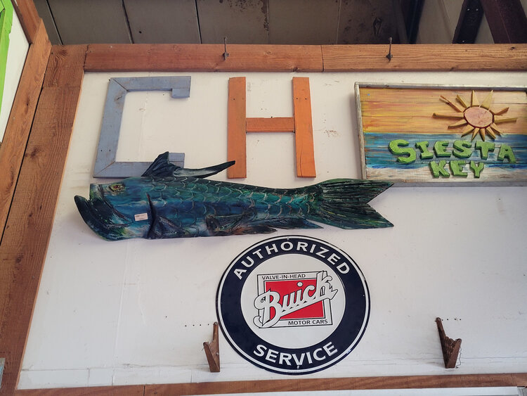 local artist hand carved fish (various styles)