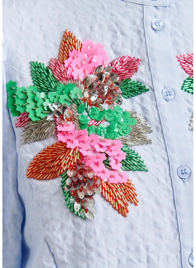 BLOUSE BLEUE FLEURS STRASS