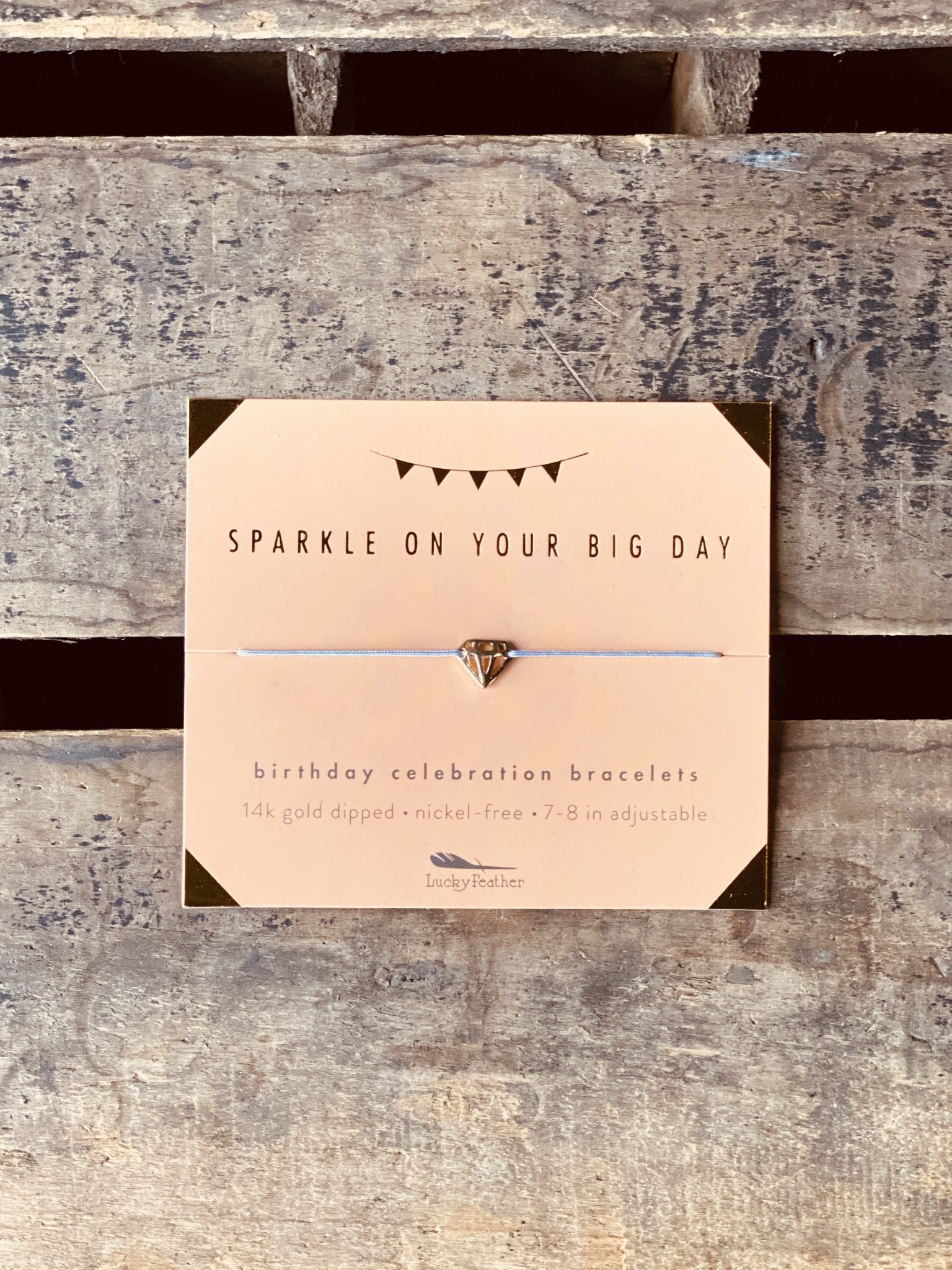 lucky feather birthday bracelet