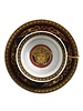 Versace The Medusa collection by Gianni Versace reflects the unmistakably rich, color-intensive world of Versace. The main focal point is a magnificent, gold-colored Medusa head, surrounded by ornate baroque decorations. This collection will serve as a brilliant