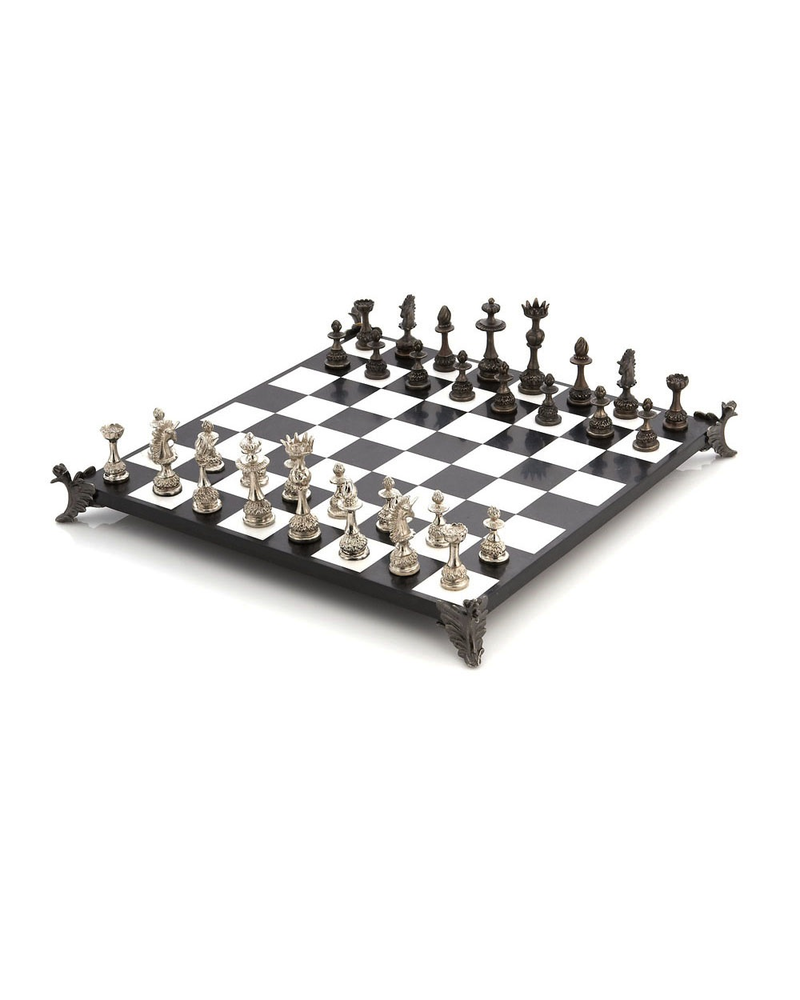 Michael Aram The Michael Aram Special Edition Chess Set is the first gaming piece made by the artist. His love of nature and antiques workmanship served as the inspiration to create what he considers a 'medieval floral fantasy' motif – unicorns with petal manes and ki
