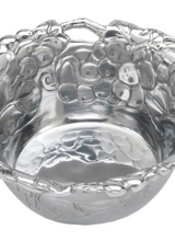 Arthur Court Designs Encase your favorite finger foods in the fruity shell of Arthur Court's Grapevine Nut Bowl. <br />
<br />
Large bundles of grapes and leaves cover the surface of this piece as vines create fingerholds in its flared edge. The heavy lines and dense patterns in this des